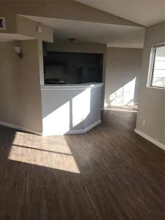 a view of an empty room and window