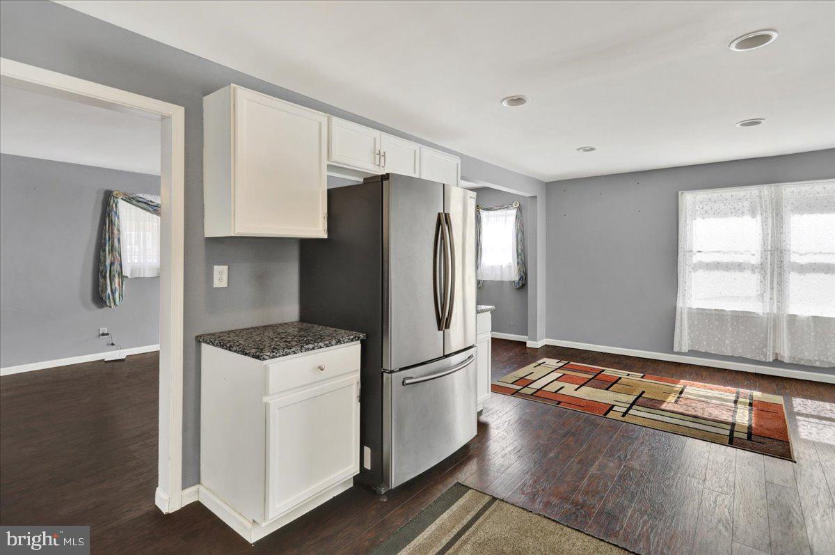 212 Mayer Street Reading, PA 19606 - Photo 16 of 37 a kitchen with a refrigerator and a stove top oven