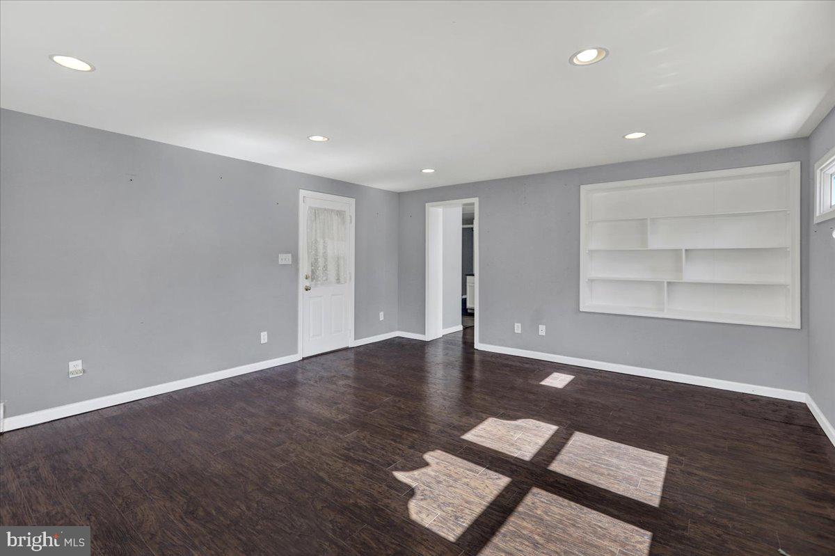 212 Mayer Street Reading, PA 19606 - Photo 18 of 37 wooden floor in an empty room with a window