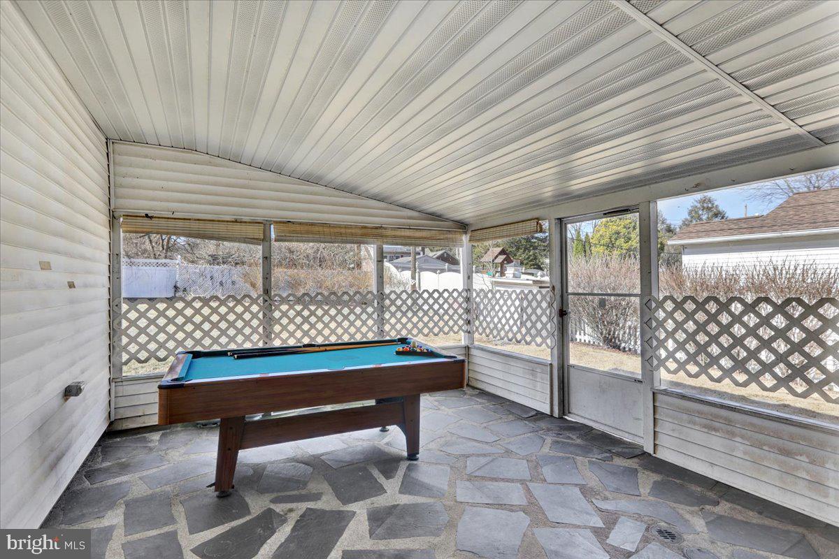 212 Mayer Street Reading, PA 19606 - Photo 19 of 37 a bedroom with furniture and a gate