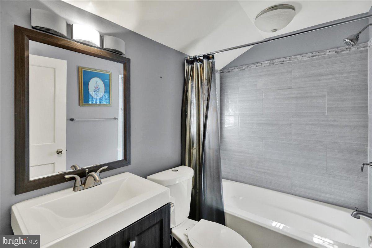 212 Mayer Street Reading, PA 19606 - Photo 27 of 37 a bathroom with a sink toilet and shower