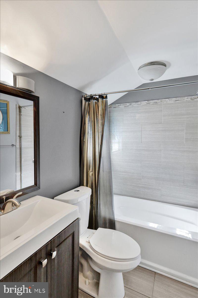 212 Mayer Street Reading, PA 19606 - Photo 28 of 37 a bathroom with a sink a toilet and shower