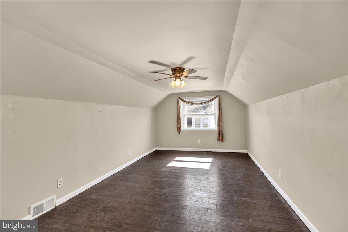 212 Mayer Street Reading, PA 19606 - Photo 29 of 37 a view of a ceiling fan with wooden floor