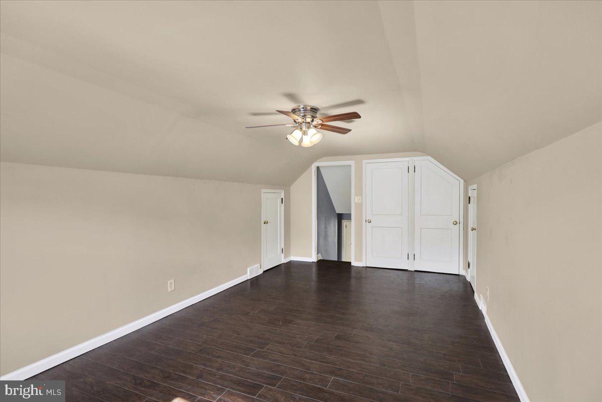 212 Mayer Street Reading, PA 19606 - Photo 30 of 37 an empty room with wooden floor and ceiling fan