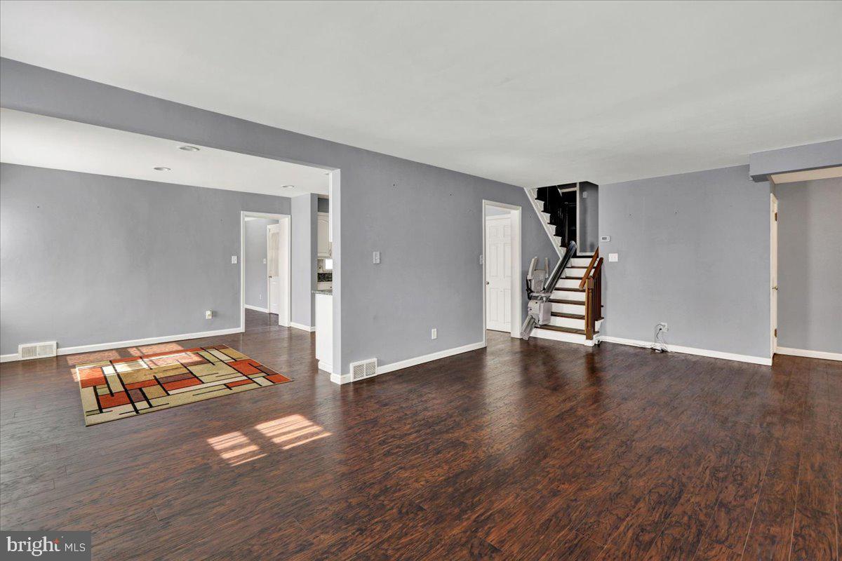 212 Mayer Street Reading, PA 19606 - Photo 9 of 37 wooden floor in an empty room with a window