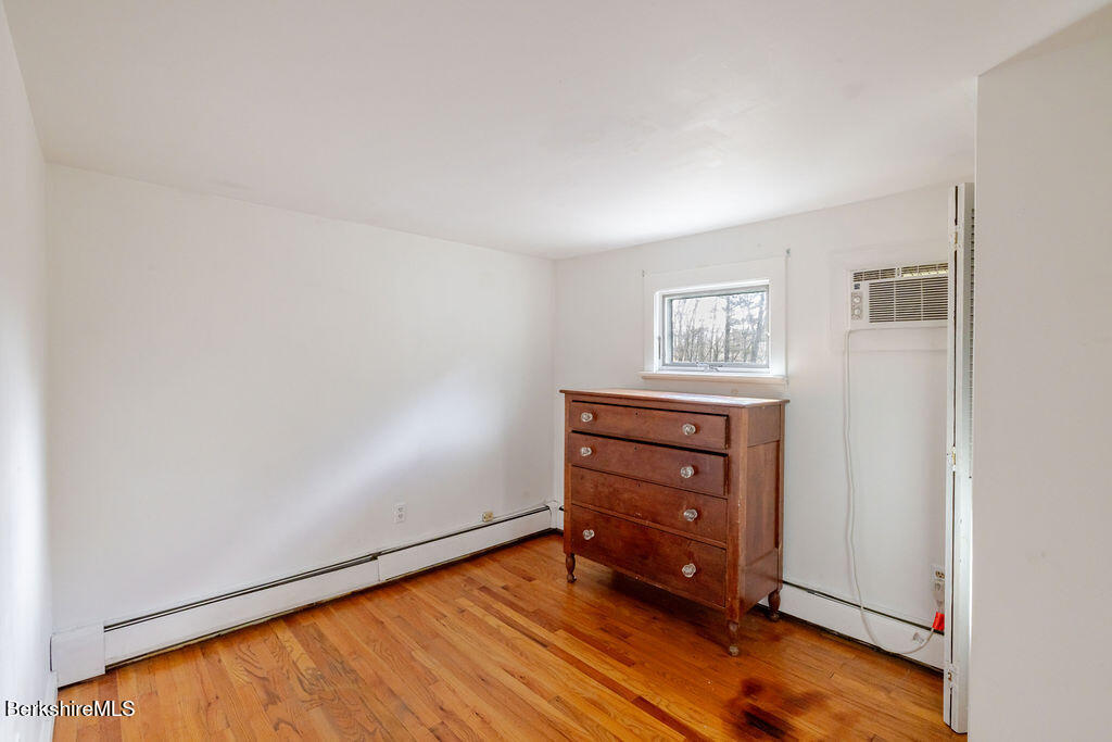 26 Lenox Road West Stockbridge, MA 01266 - Photo 22 of 40 an empty room with windows and closet