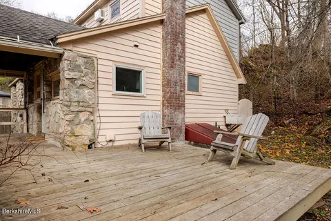 a backyard of a house with seating space