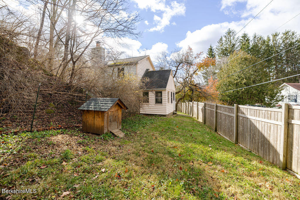 26 Lenox Road West Stockbridge, MA 01266 - Photo 31 of 40 a view of a house with backyard and trees