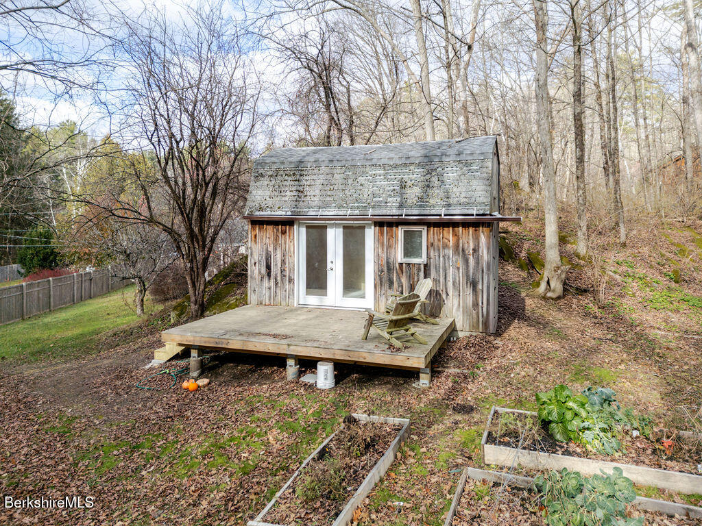 26 Lenox Road West Stockbridge, MA 01266 - Photo 34 of 40 a view of backyard with deck and garden