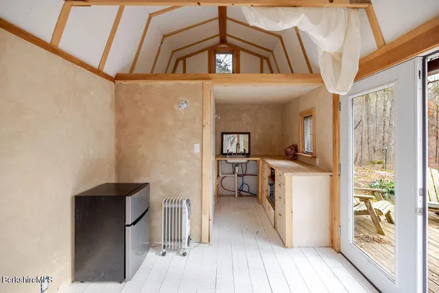 a view of a hallway with a workspace