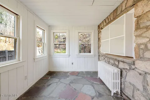 an empty room with windows