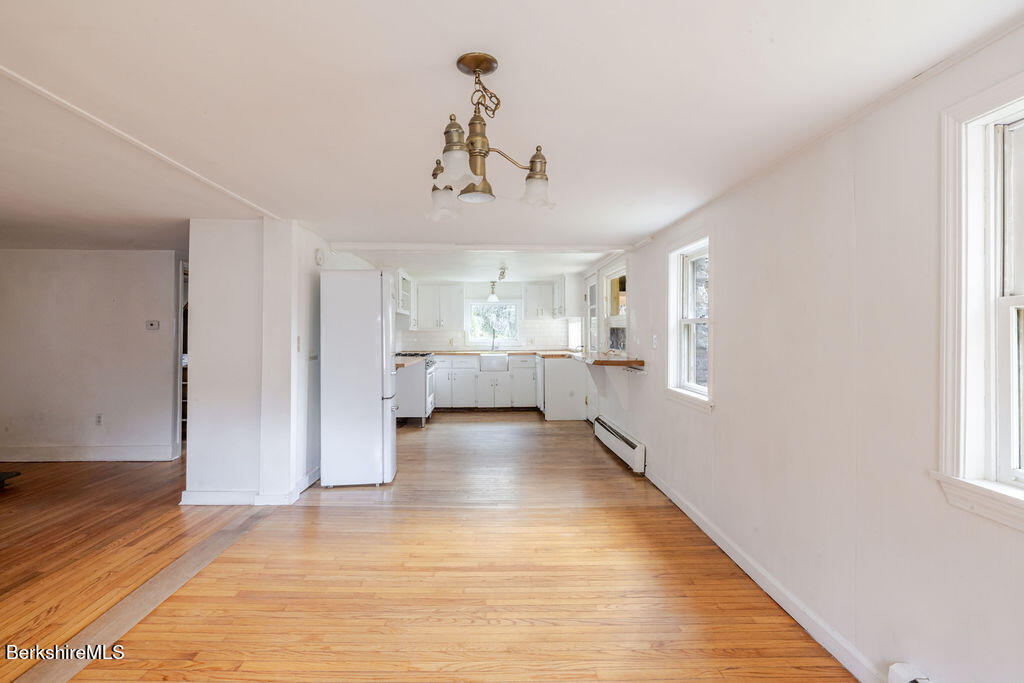 26 Lenox Road West Stockbridge, MA 01266 - Photo 7 of 40 a view of a room with wooden floor and window