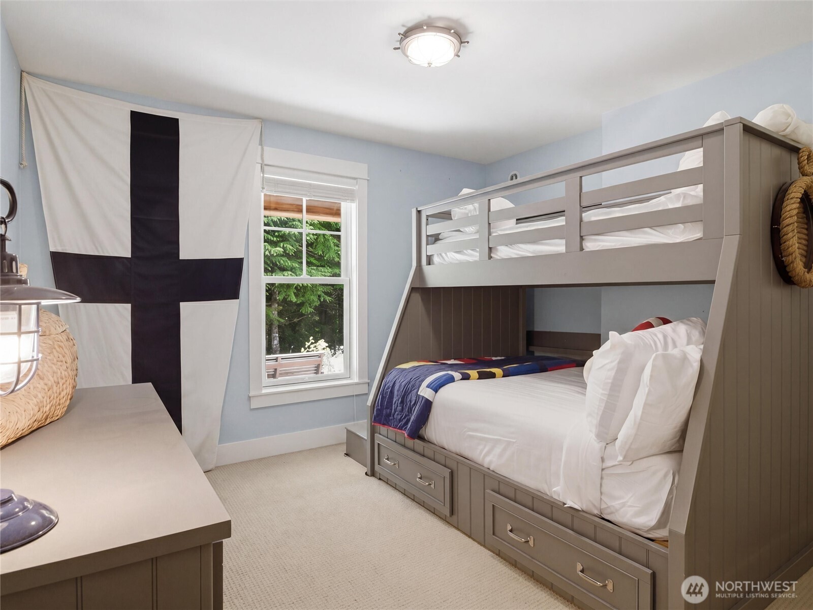 269 Compass Street Pacific Beach, WA 98571 - Photo 27 of 38 a bedroom with a bed and a window