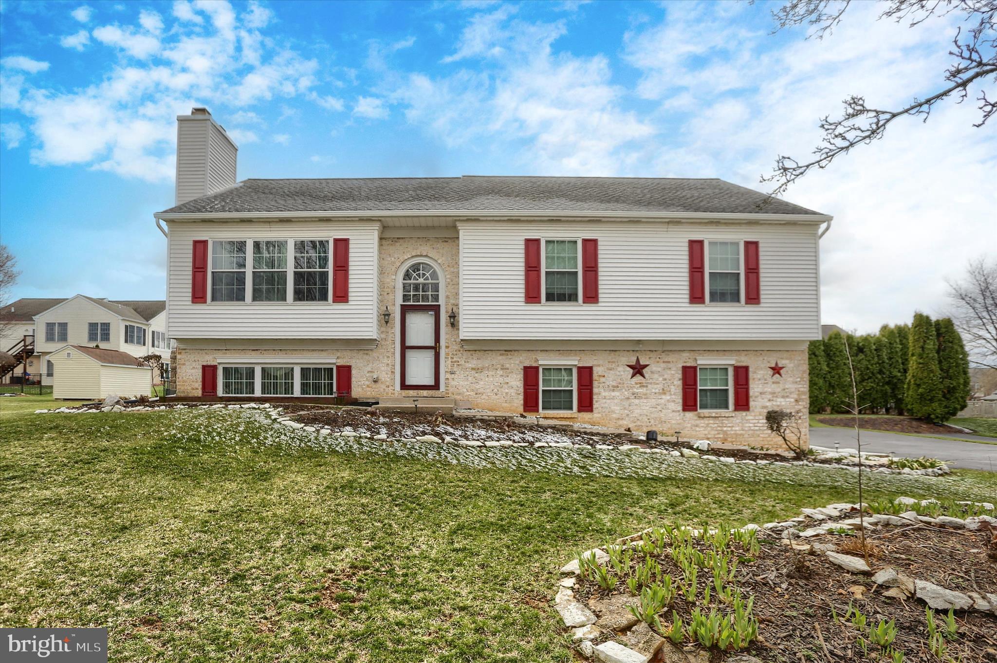 26 Rye Lane Palmyra, PA 17078 - Photo 2 of 52 a front view of a house with a yard