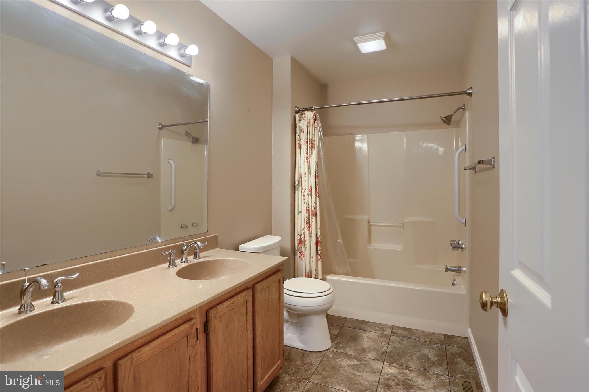 26 Rye Lane Palmyra, PA 17078 - Photo 32 of 52 a bathroom with a granite countertop sink toilet and shower