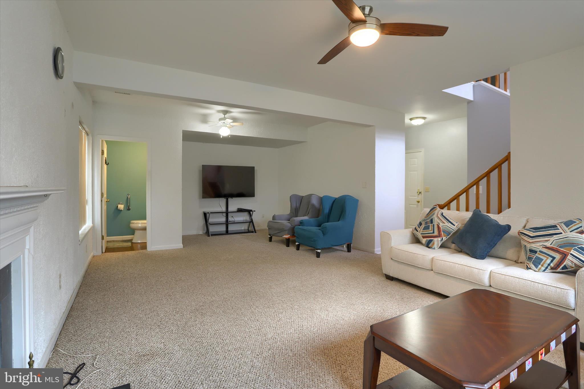 26 Rye Lane Palmyra, PA 17078 - Photo 39 of 52 a living room with furniture and a flat screen tv