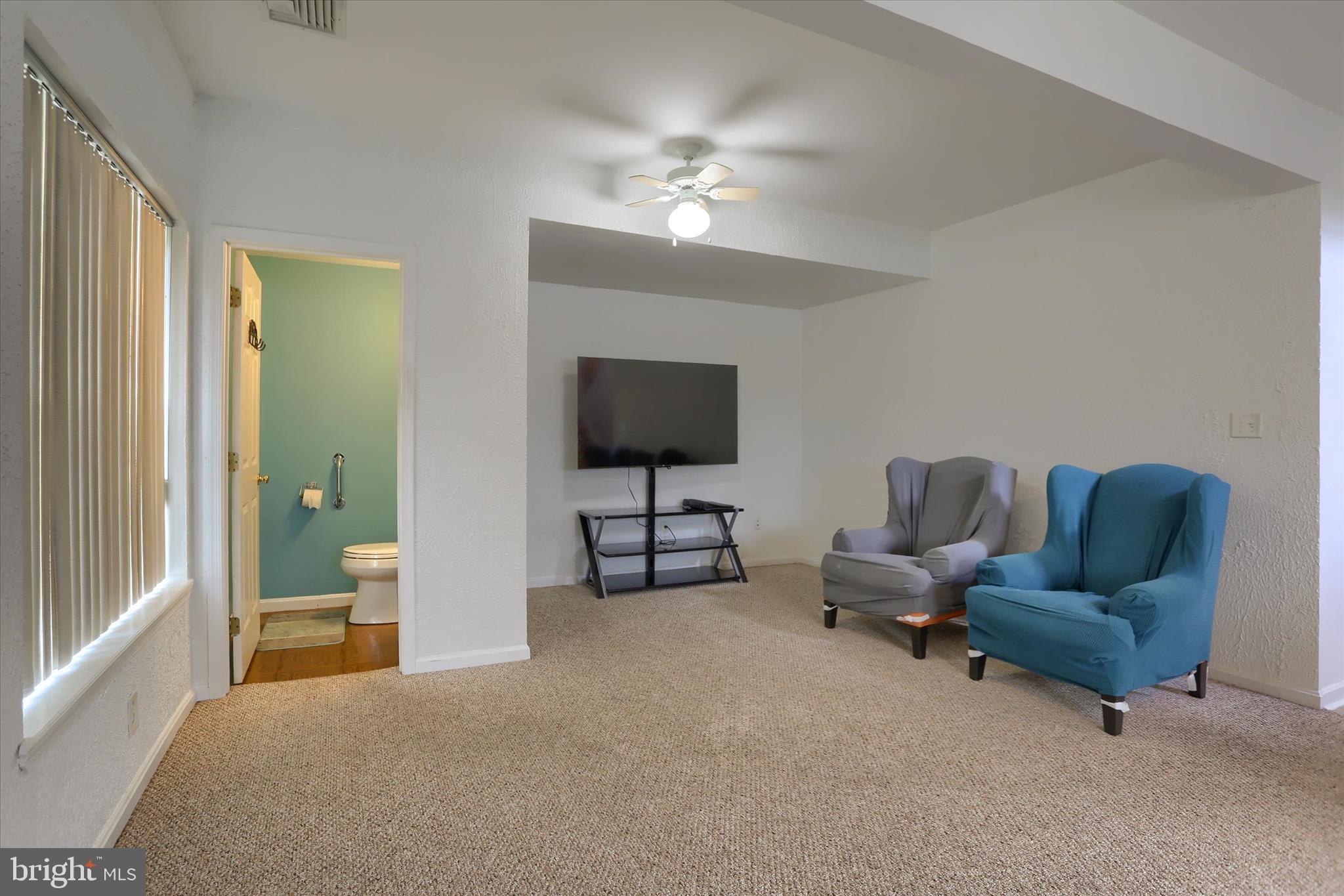 26 Rye Lane Palmyra, PA 17078 - Photo 40 of 52 a living room with furniture and a flat screen tv