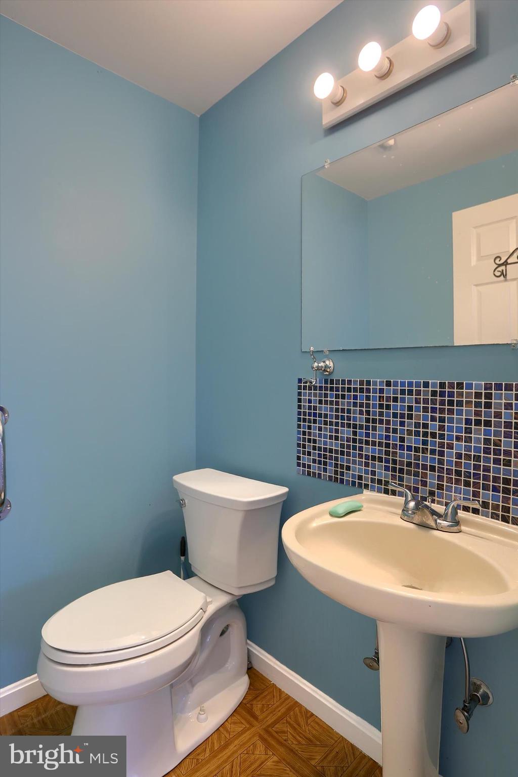 26 Rye Lane Palmyra, PA 17078 - Photo 42 of 52 a bathroom with a sink a toilet and mirror