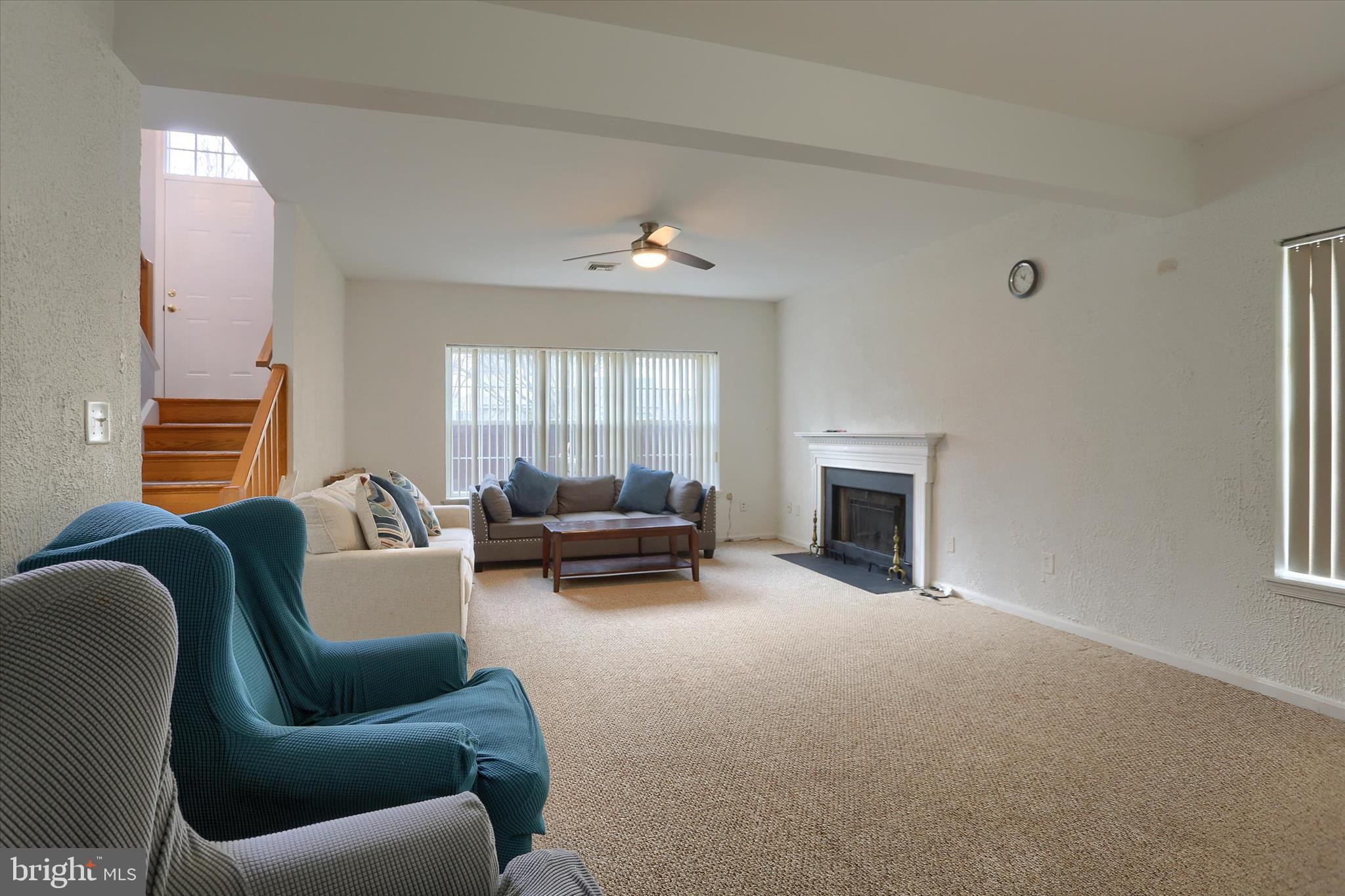 26 Rye Lane Palmyra, PA 17078 - Photo 44 of 52 a living room with furniture and a fireplace