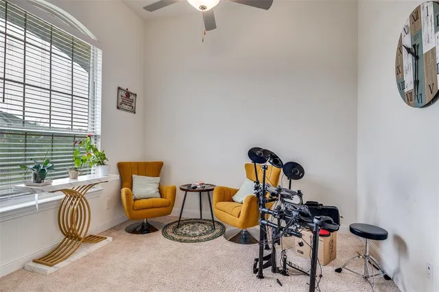 a kitchen with stainless steel appliances granite countertop a refrigerator a stove and a wooden cabinets