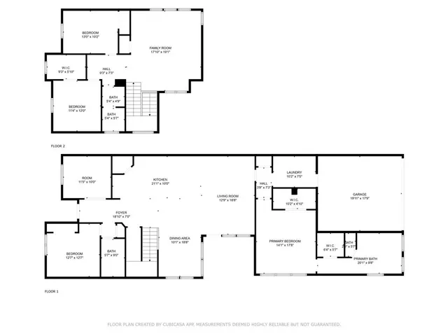 a black and white photo of a living room