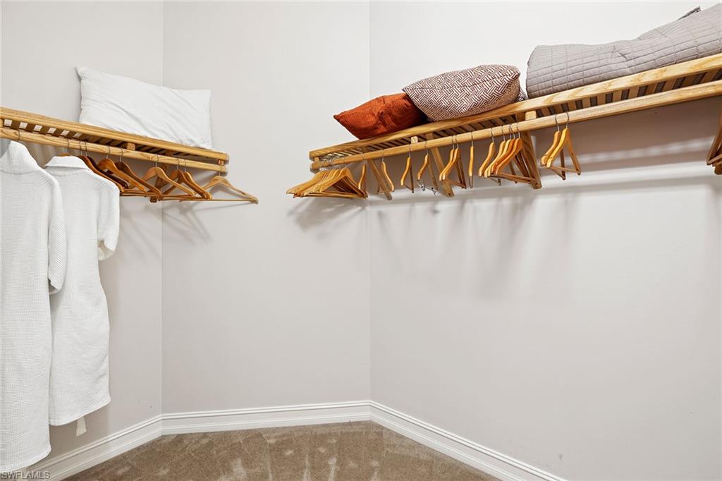 6513 Caldecott Drive Naples, FL 34113 - Photo 24 of 33 a view of walk in closet