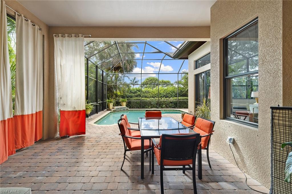 6513 Caldecott Drive Naples, FL 34113 - Photo 4 of 33 a outdoor space with furniture