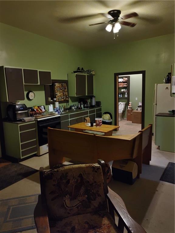 7157 Ridge Road Mahaffey, PA 15757 - Photo 14 of 50 a living room with furniture a chandelier and a piano