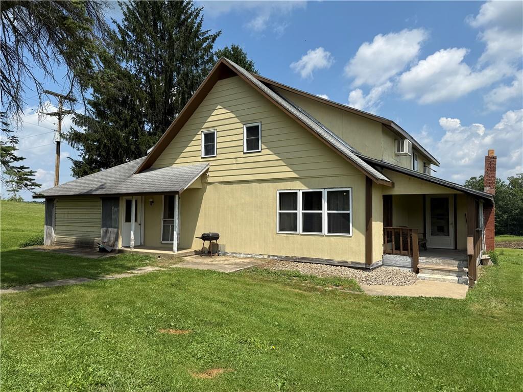 7157 Ridge Road Mahaffey, PA 15757 - Photo 26 of 50 a front view of a house with a yard