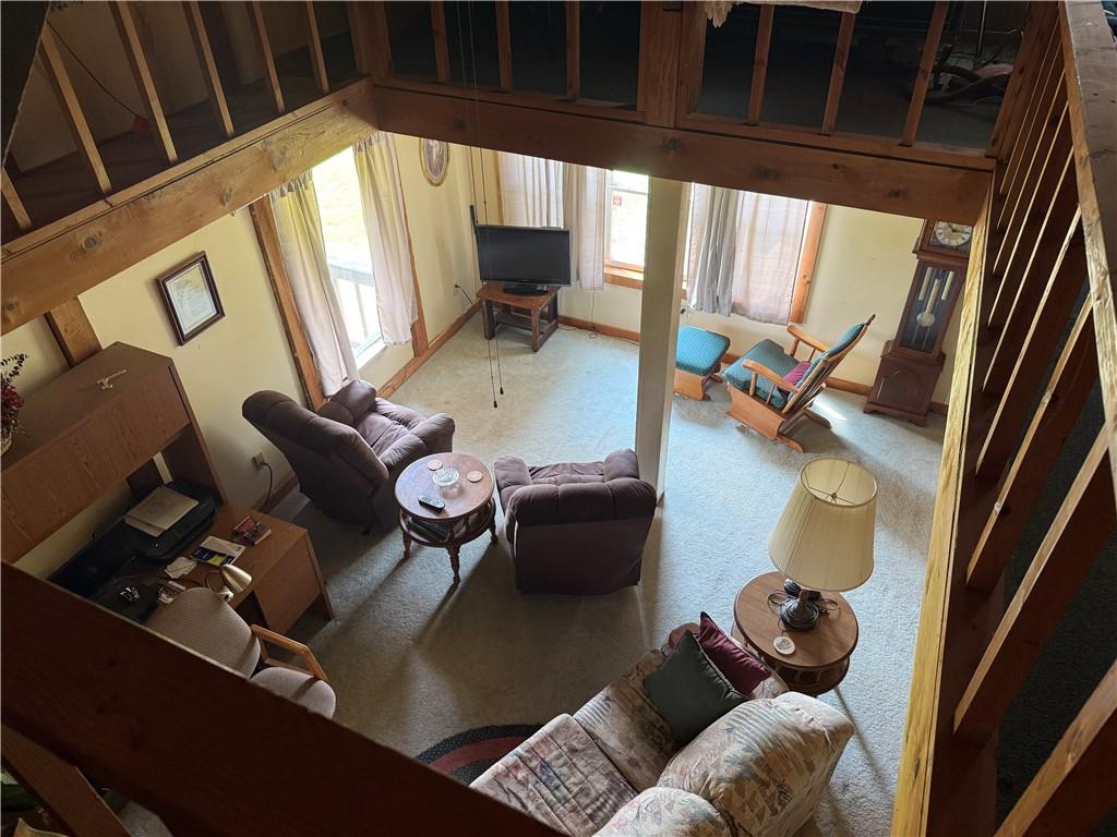 7157 Ridge Road Mahaffey, PA 15757 - Photo 31 of 50 a living room with furniture and a floor to ceiling window
