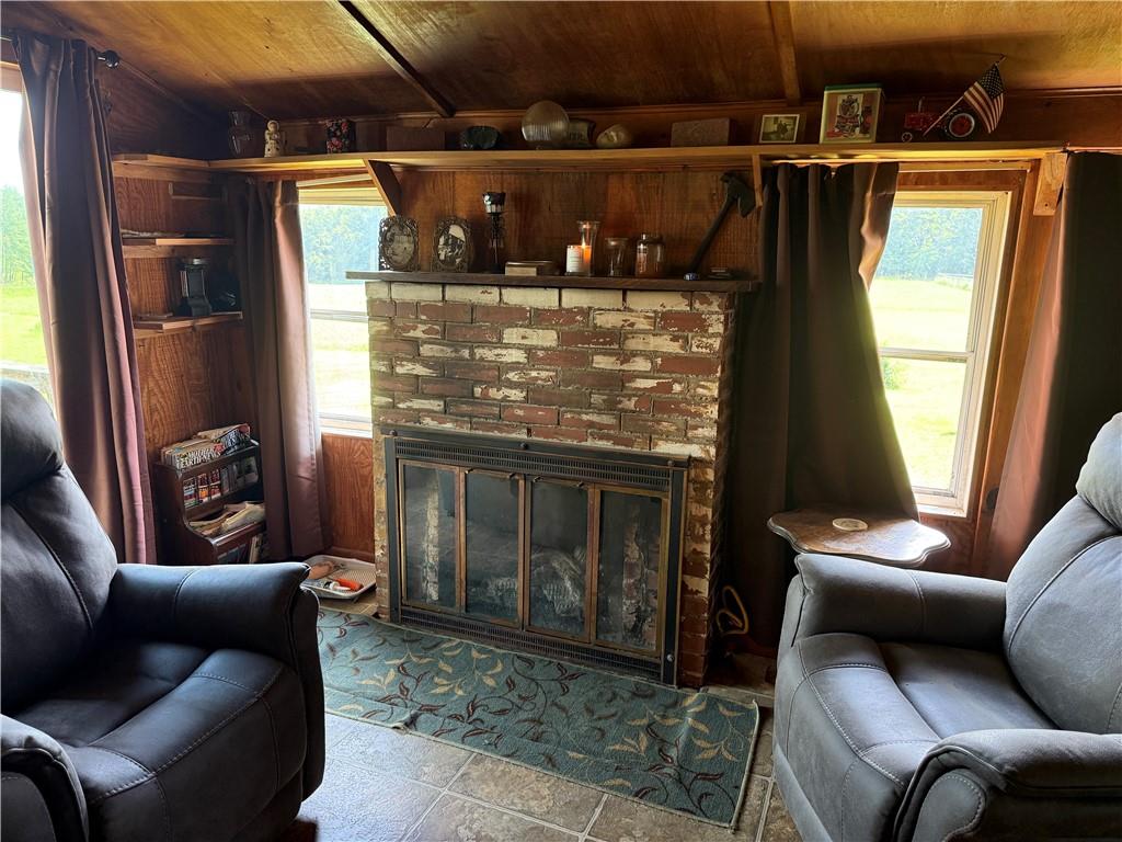7157 Ridge Road Mahaffey, PA 15757 - Photo 35 of 50 a living room with furniture and a window