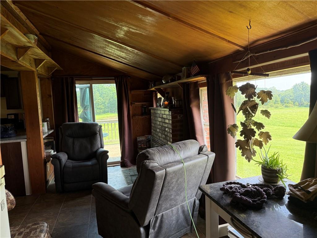 7157 Ridge Road Mahaffey, PA 15757 - Photo 36 of 50 a living room with furniture and a flat screen tv