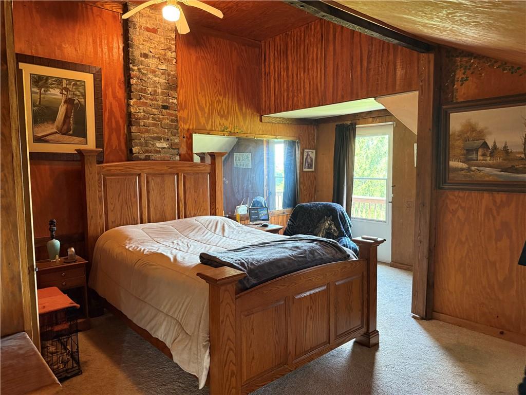 7157 Ridge Road Mahaffey, PA 15757 - Photo 38 of 50 a bed sitting in a bedroom next to a window