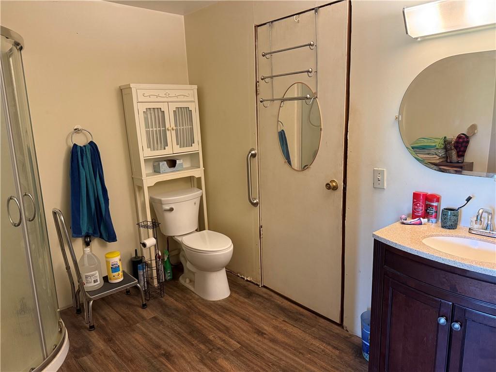 7157 Ridge Road Mahaffey, PA 15757 - Photo 48 of 50 a bathroom with a toilet a sink and a mirror