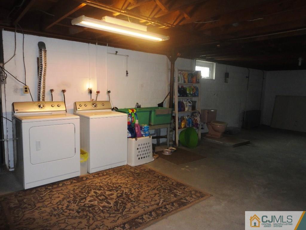 33 Enfield Road Colonia, NJ 07067 - Photo 7 of 9 a room with storage and utility