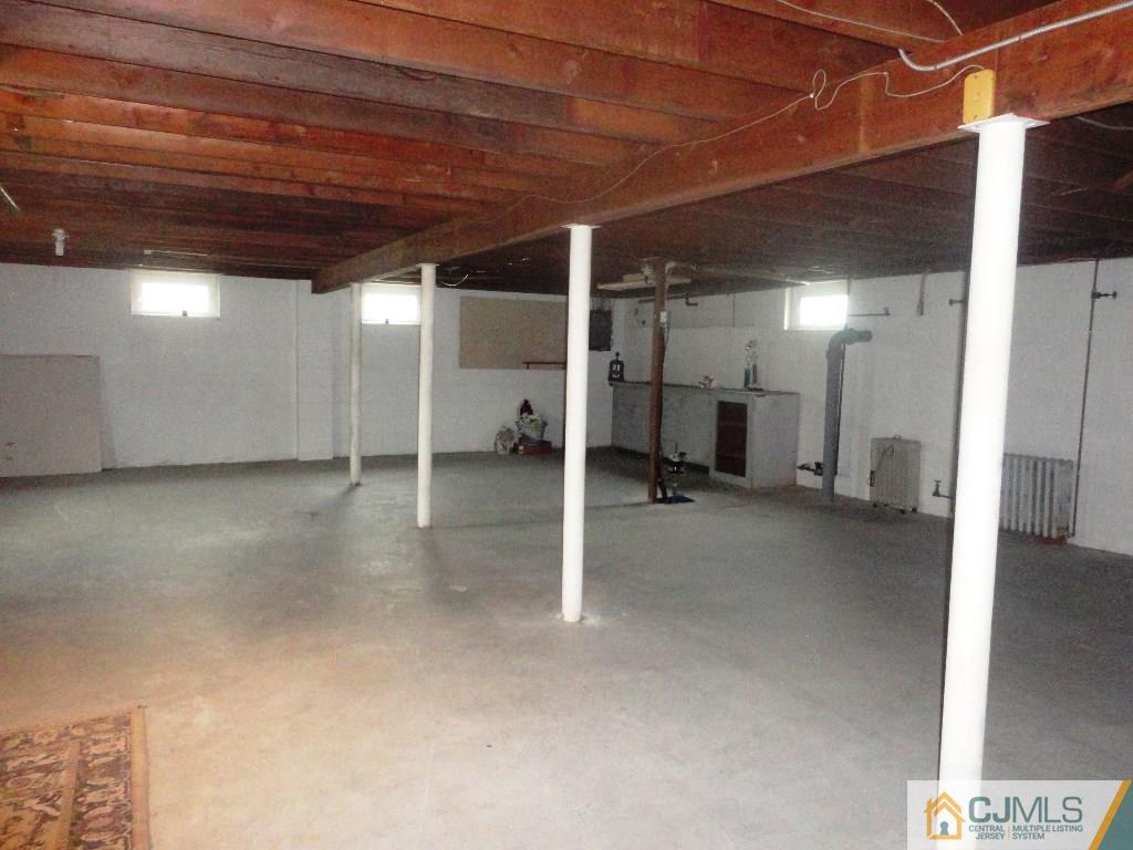 33 Enfield Road Colonia, NJ 07067 - Photo 8 of 9 a view of a room with wooden walls