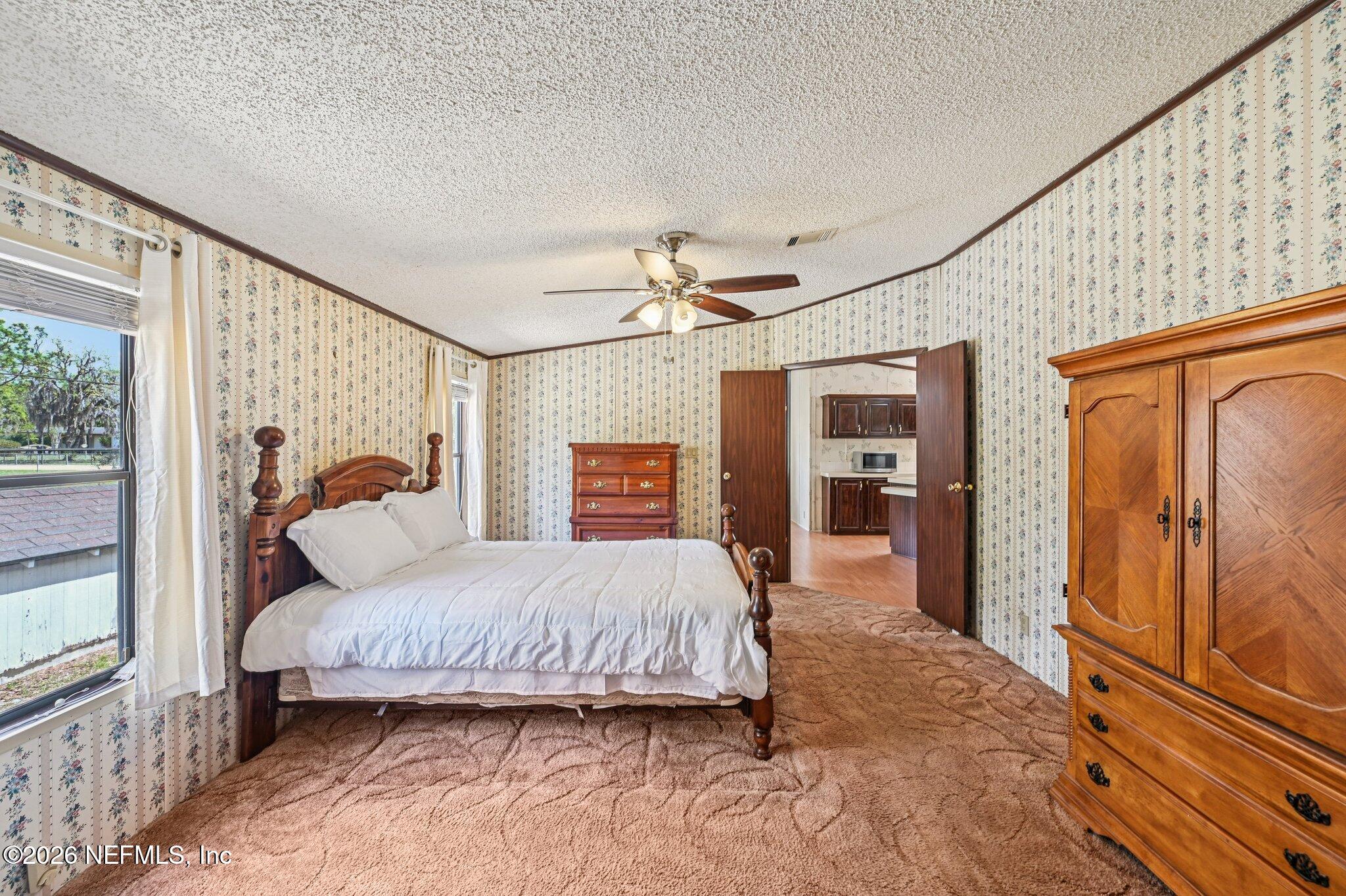 128 Sesame Street Middleburg, FL 32068 - Photo 35 of 66 Large Primary Bedroom