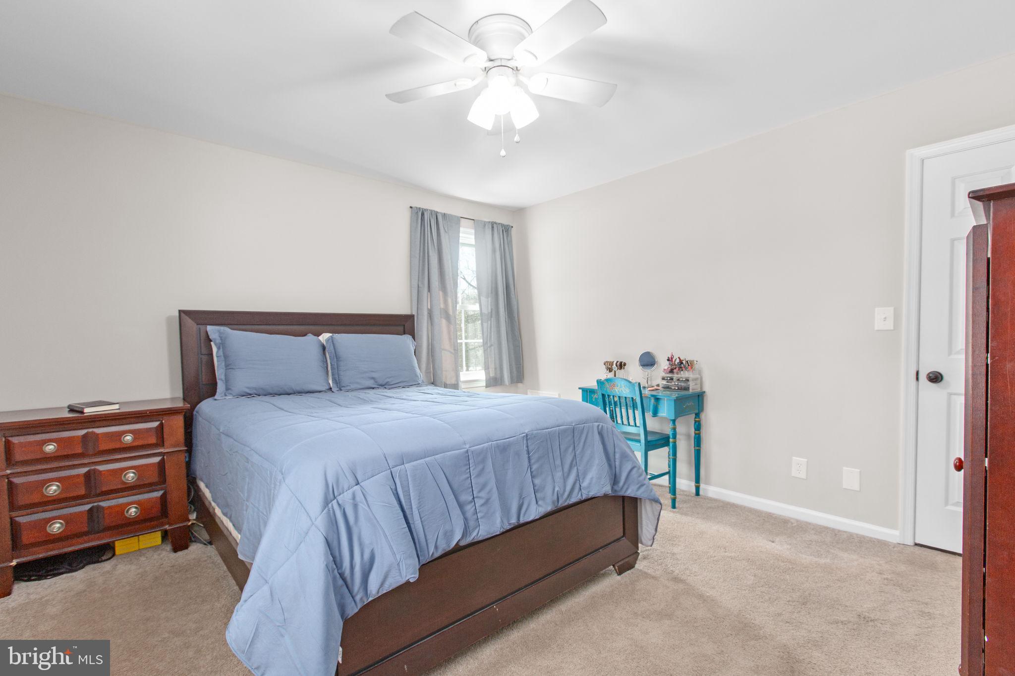 391 Holly Corner Road Fredericksburg, VA 22406 - Photo 23 of 33 Carpeted with ceiling fan light fixture