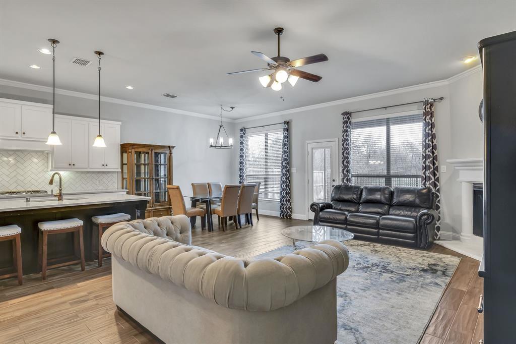 1306 Elizabeth Street Anna, TX 75409 - Photo 5 of 36 a living room with furniture and a wooden floor