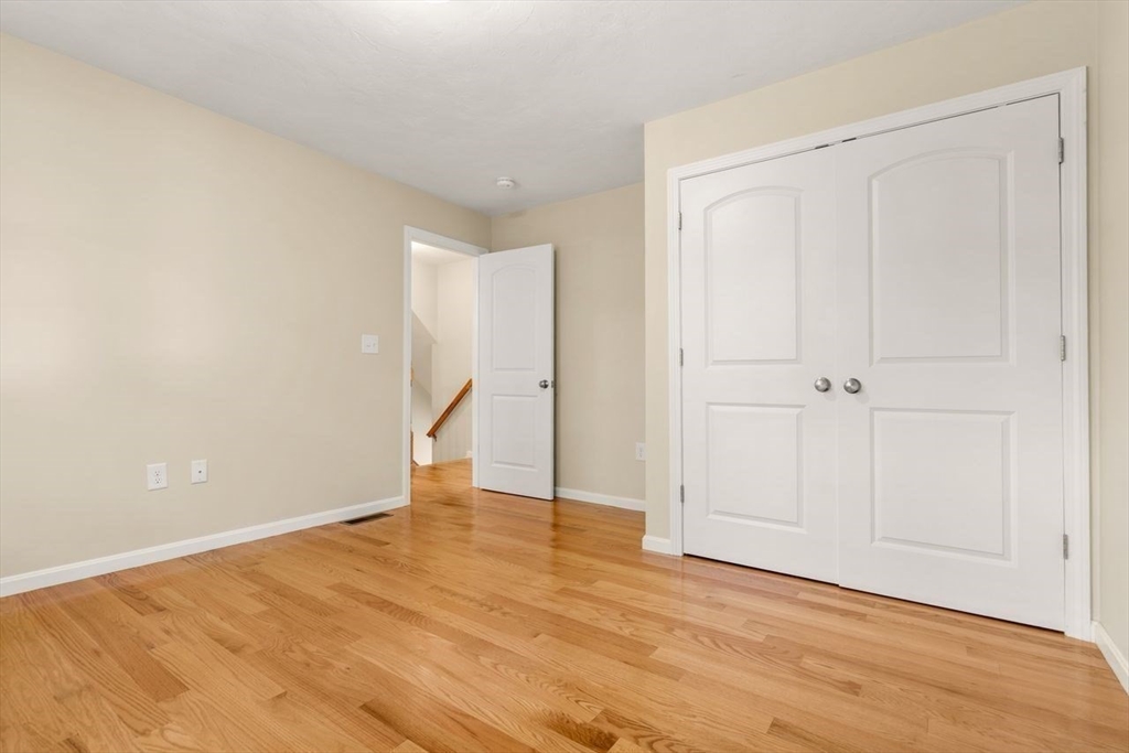 79 Bridle Road Billerica, MA 01821 - Photo 22 of 42 wooden floor in an empty room