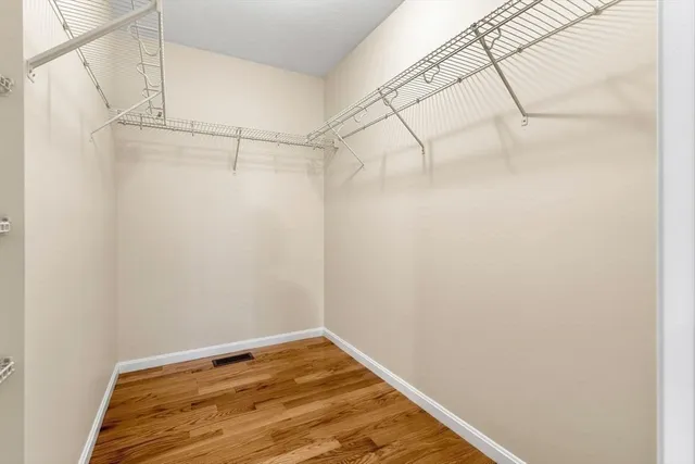 a view of a room with racks on the wall