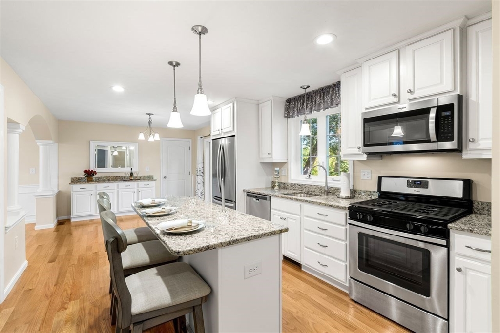 79 Bridle Road Billerica, MA 01821 - Photo 3 of 42 a kitchen with a sink microwave and refrigerator