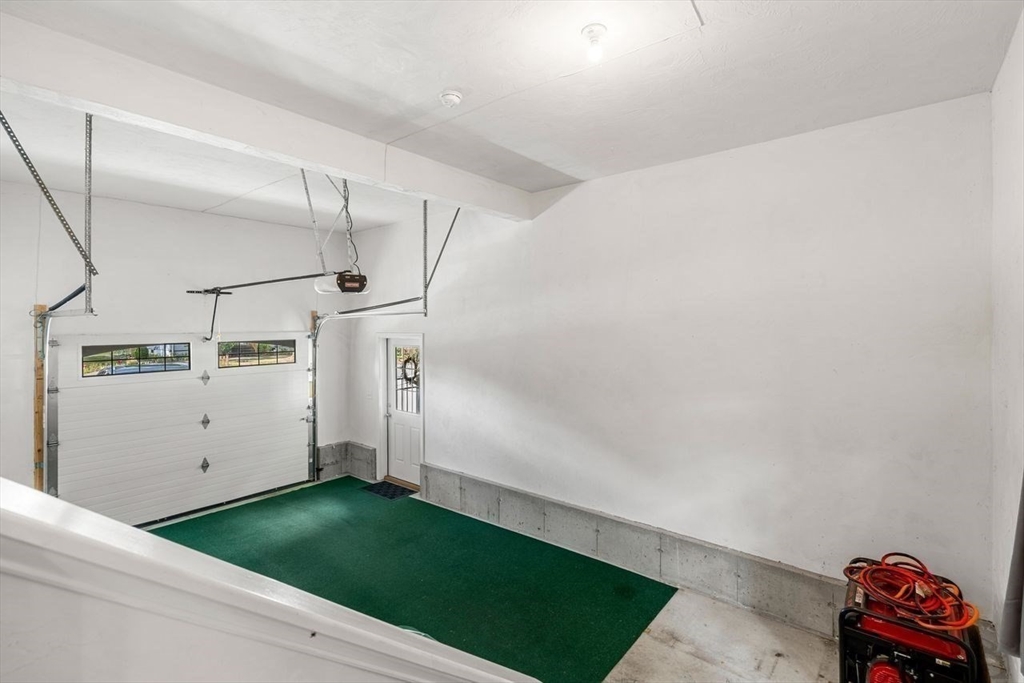 79 Bridle Road Billerica, MA 01821 - Photo 32 of 42 a utility room with cabinets and a wooden floors