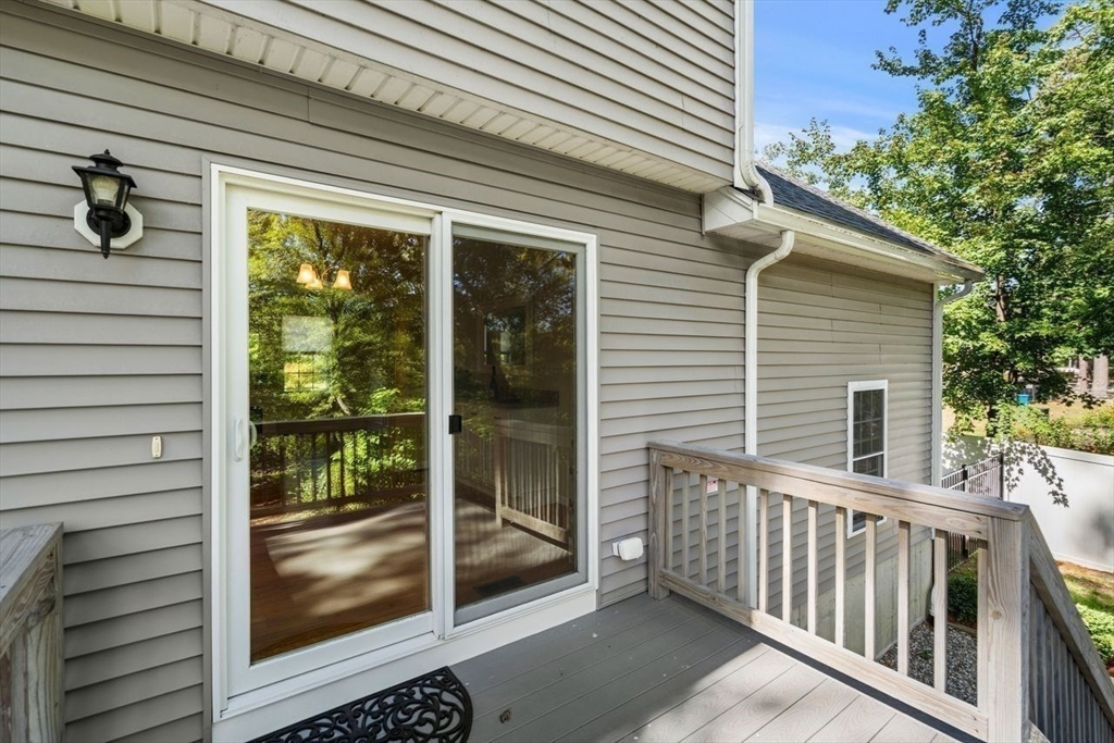 79 Bridle Road Billerica, MA 01821 - Photo 34 of 42 a view of a porch with furniture