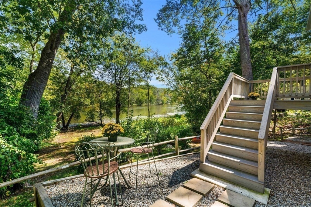 79 Bridle Road Billerica, MA 01821 - Photo 35 of 42 a view of balcony with wooden floor and fence