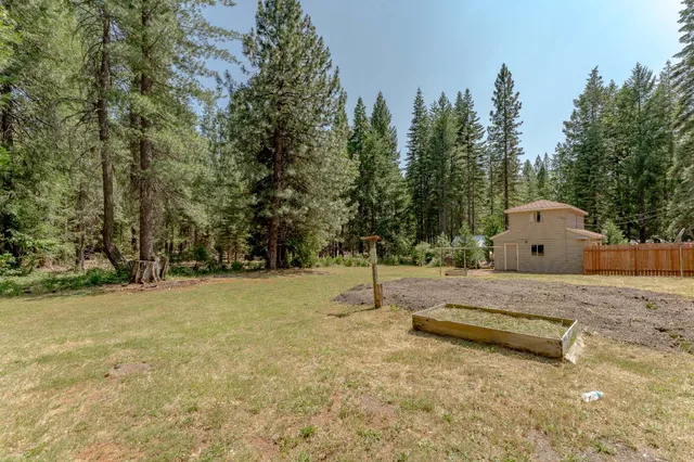 a house with trees in the background