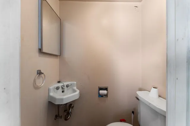 a bathroom with a sink and a toilet
