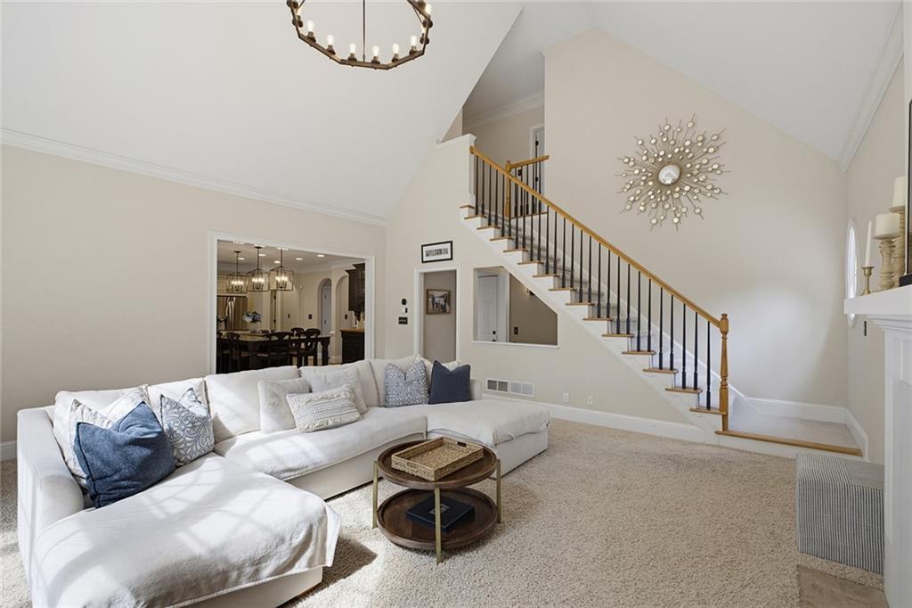 14442 Club Circle Milton, GA 30004 - Photo 19 of 82 a living room with furniture and stairs