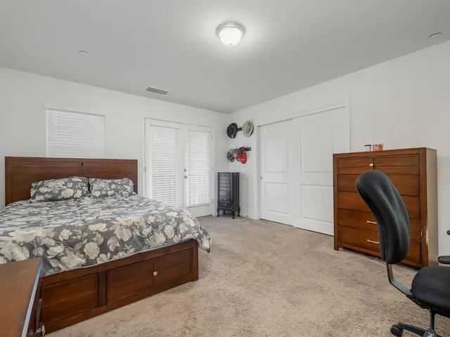 a room with a bed and a chair