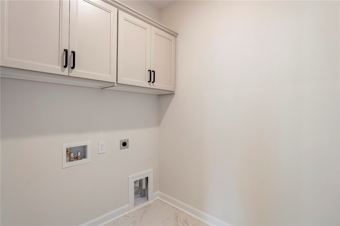 114 Lakeside Drive Anderson, SC 29621 - Photo 23 of 37 Bright and functional laundry area with ample cabinetry, ready for your appliances.